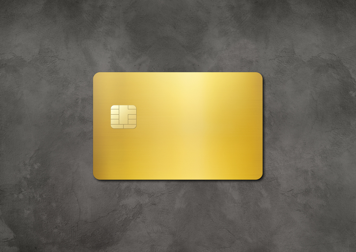Blank Gold Credit Card on Concrete Background